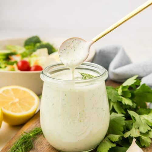spooning out homemade ranch dressing