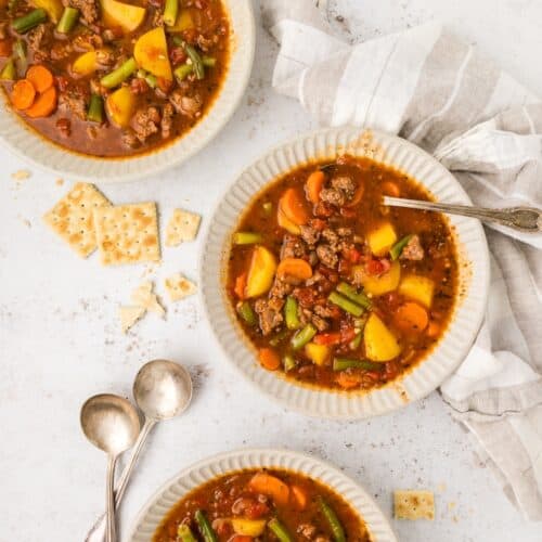 Top shot of Beef Vegetable Soup served in bowls.