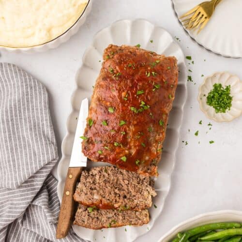 Healthy Meatloaf sliced on a serving platter.