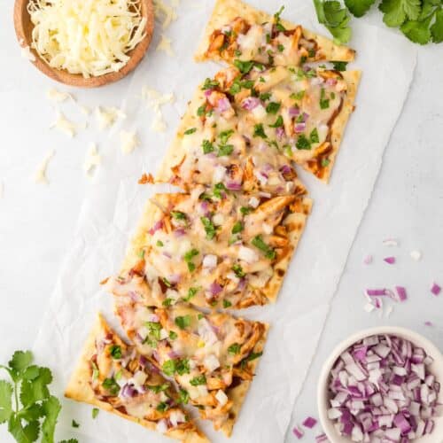 bbq chicken flatbread on parchment paper