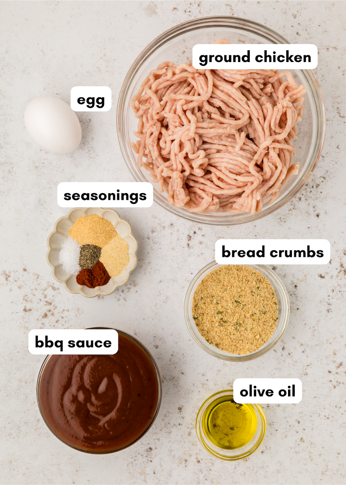 BBQ Chicken Meatballs made with ground chicken, egg, seasonings, bread crumbs, and BBQ sauce.