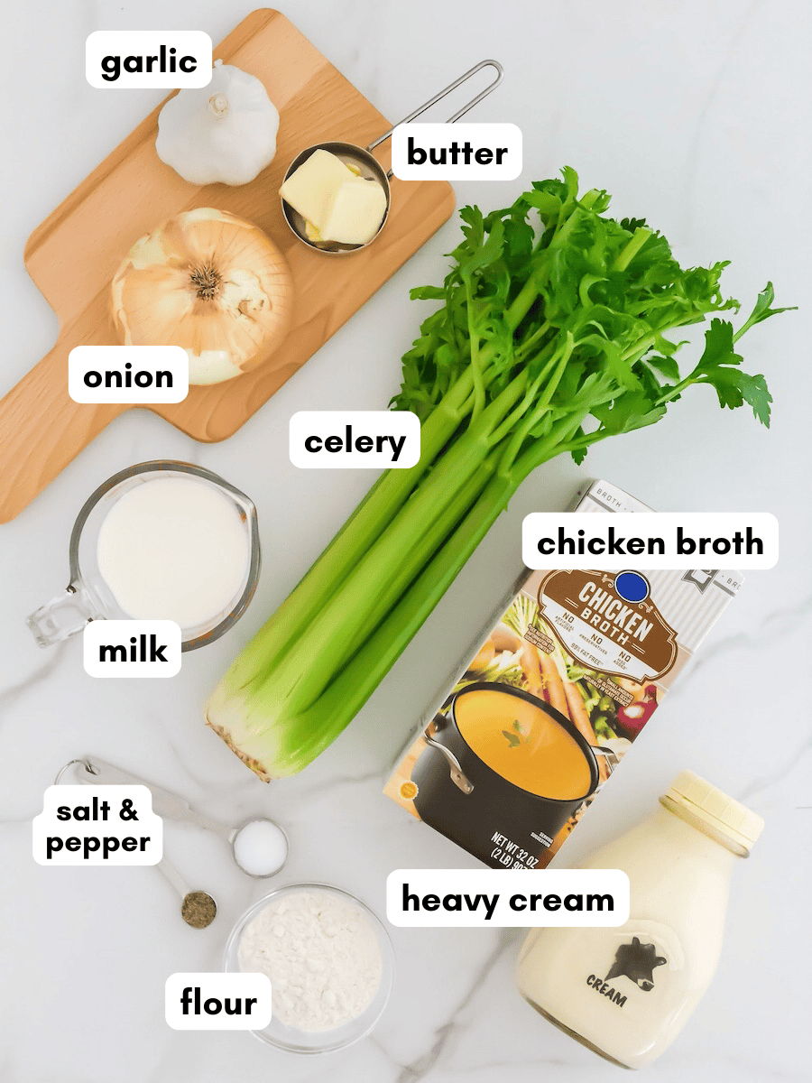 Celery, onion, garlic, butter, flour, chicken broth, milk, cream, salt, and pepper on a table.