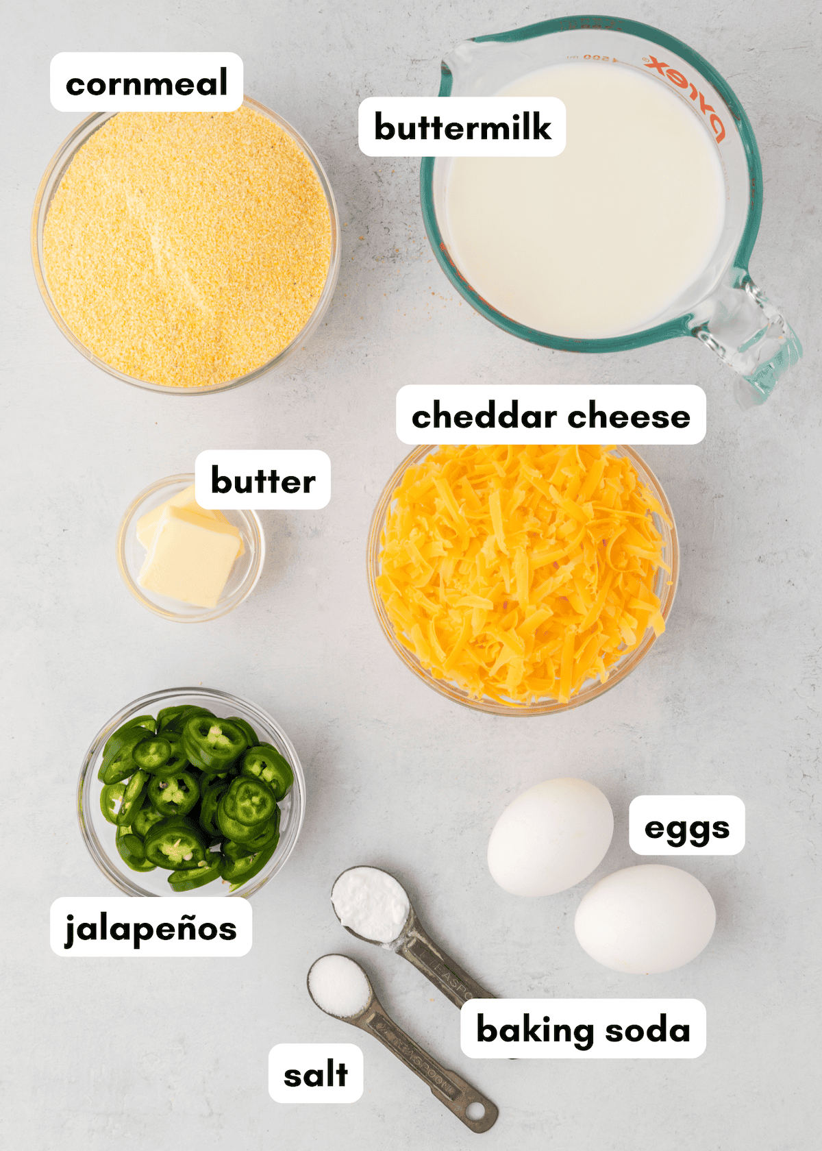 Jalapeño Cheddar Cornbread with cornmeal, buttermilk, cheese, butter, eggs, salt, and soda.