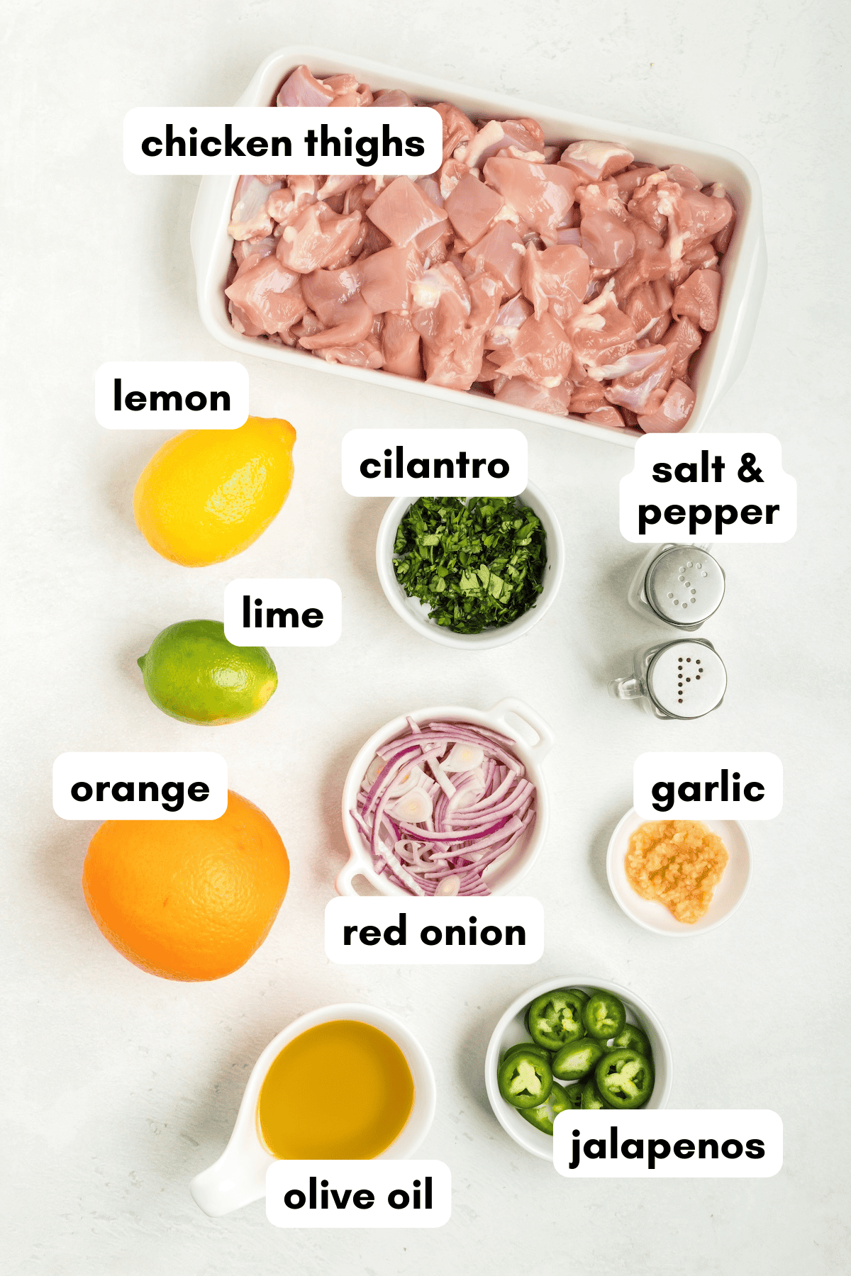 Citrus chicken tacos with chicken thighs, citrus, cilantro, jalapenos, and red onion.