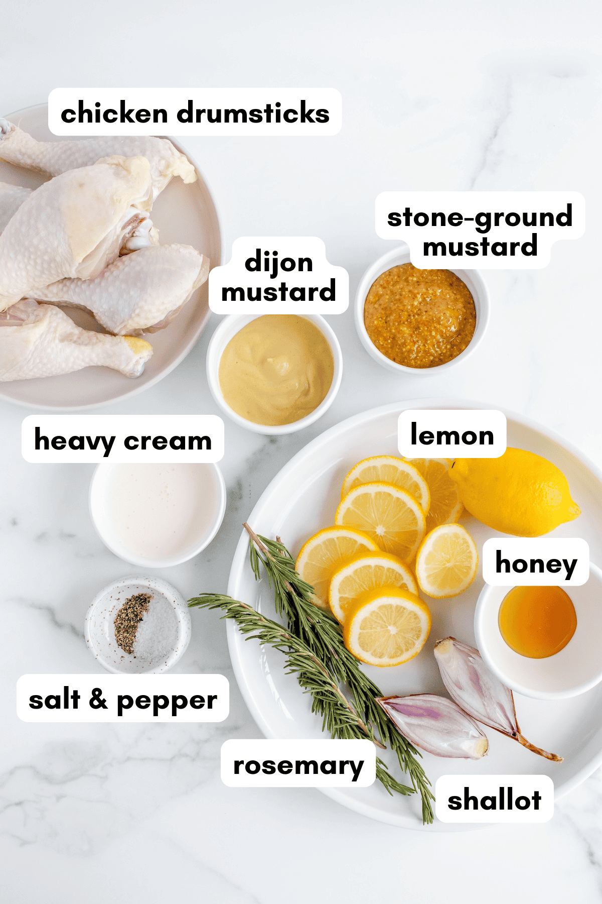 Ingredients for a chicken dish, labeled: drumsticks, mustards, lemon, honey, cream, salt, herbs.