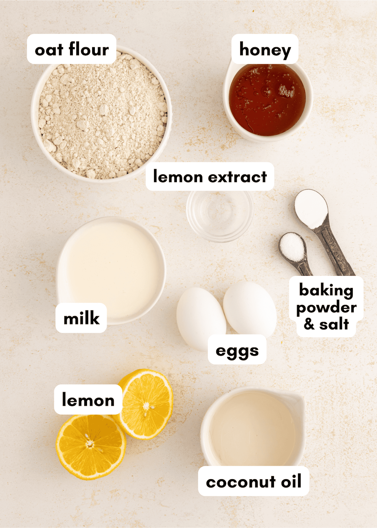 Gluten-Free Lemon Cake ingredients: oat flour, honey, lemon, eggs, milk, coconut oil, spices.