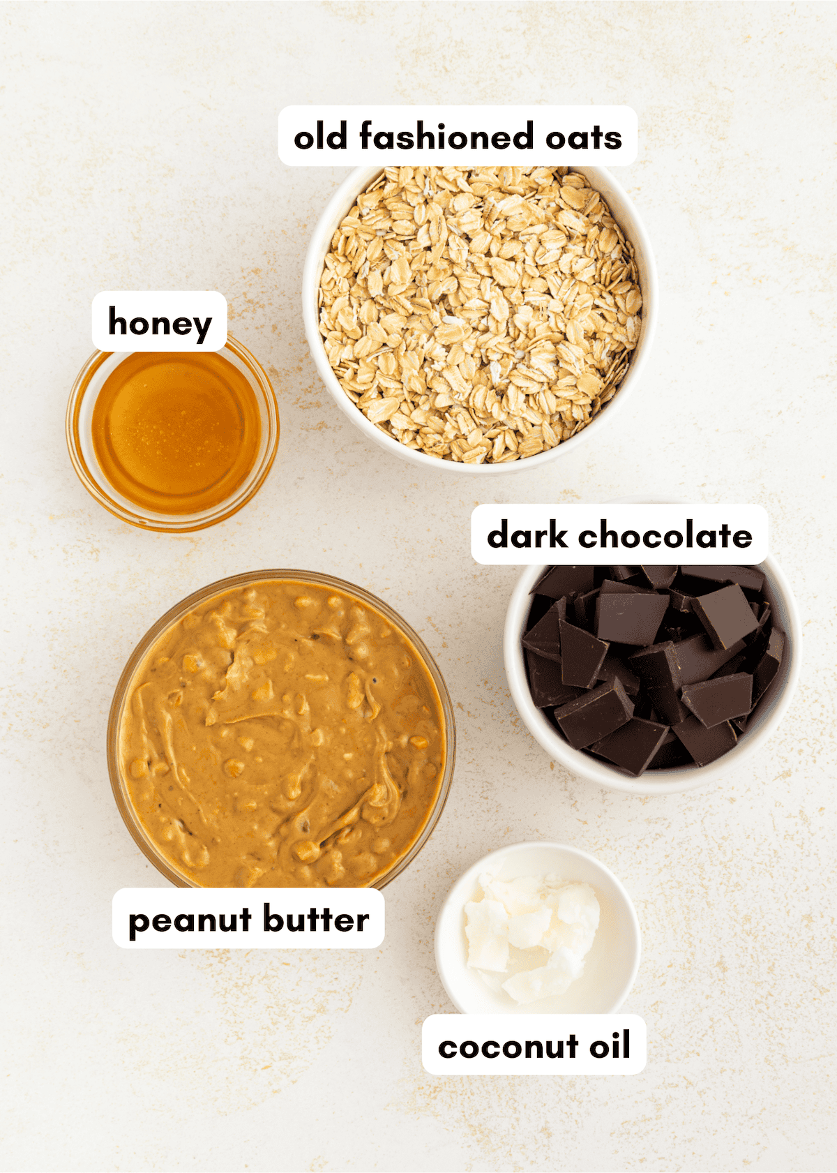 Peanut Butter Oat Cups ingredients: old fashioned oats, honey, dark chocolate, and coconut oil.