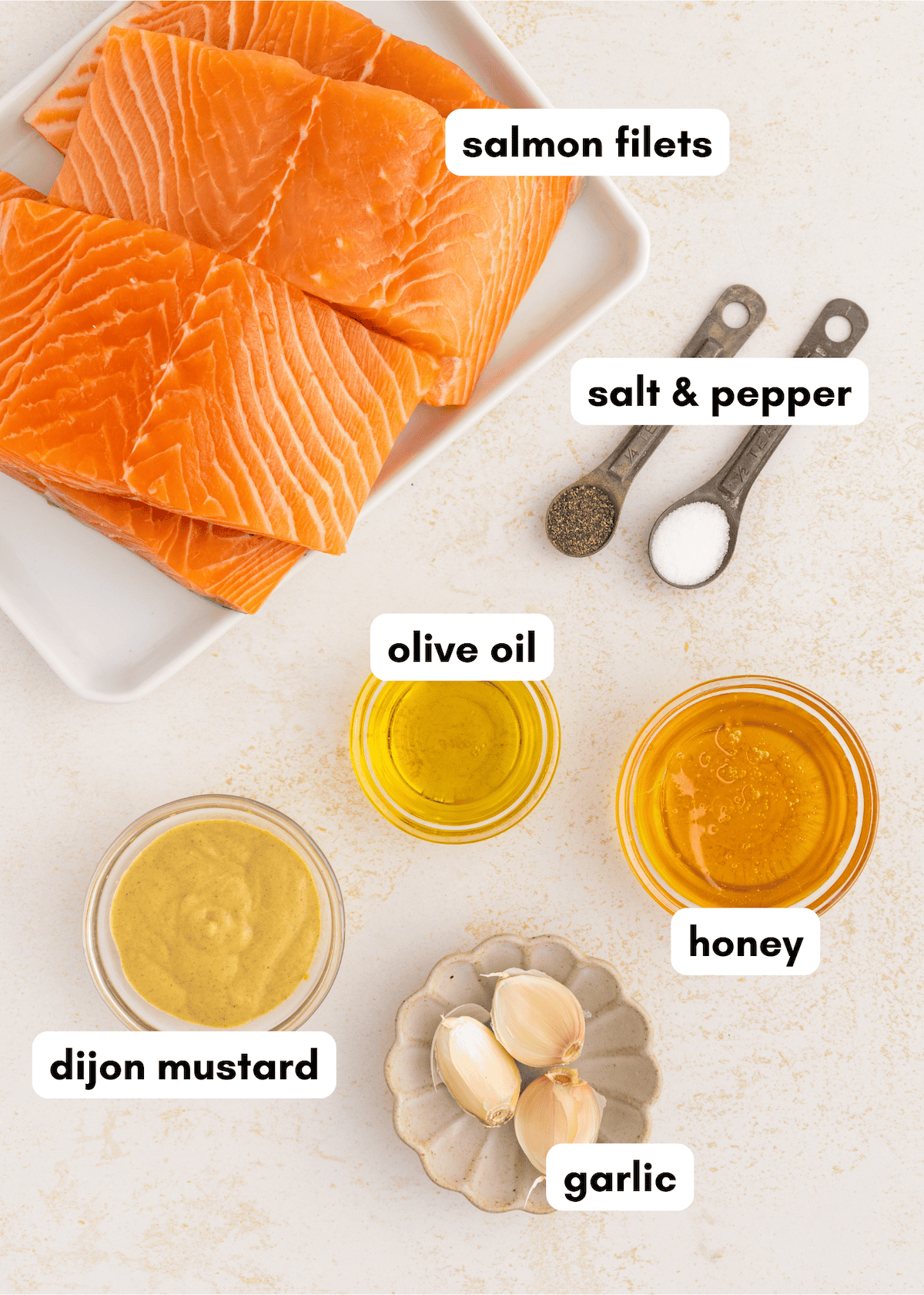Honey mustard salmon filets with spices, olive oil, honey, Dijon mustard, and garlic.