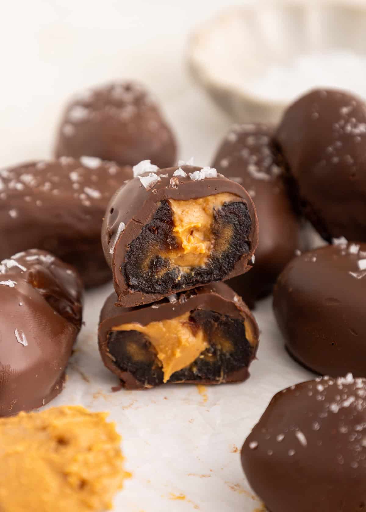 Chocolate-covered dates filled with peanut butter and topped with sea salt.